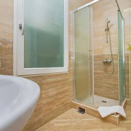 Lausion Apartments Апартаменты
